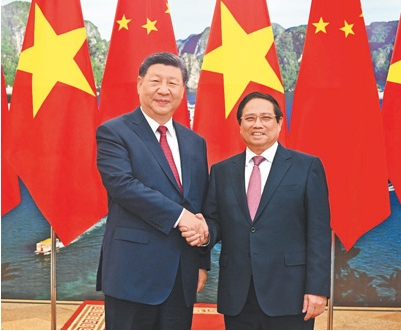 习近平会见越南总理范明政